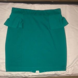 Green peplum skirt